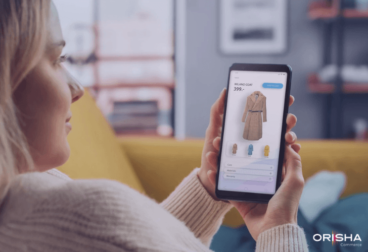 A woman using a smartphone to browse a personalized e-commerce product page for a Milano Coat with color variations.
