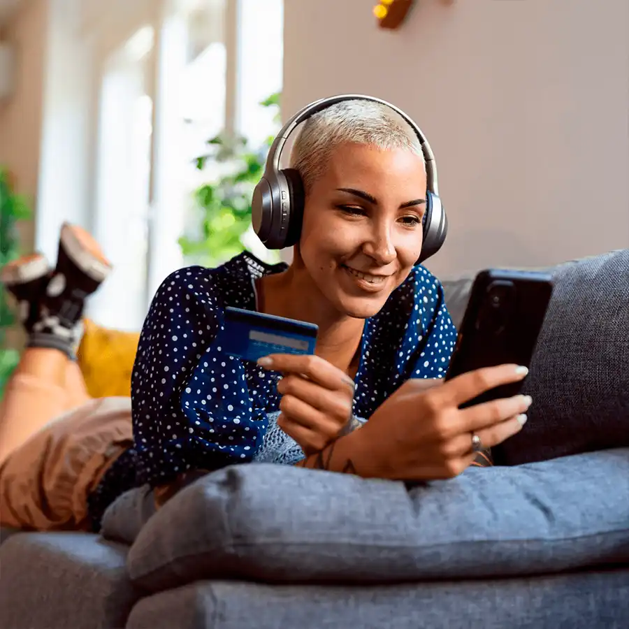 Woman completing an online order in her favourite brand from a mobile device